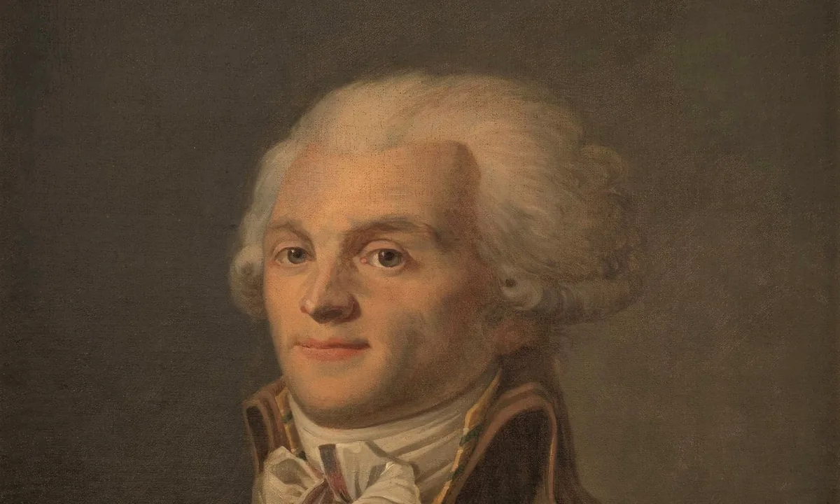 Portrait of Robespierre with powdered hair, a white cravat and a striped brown coat, smiling slightly.