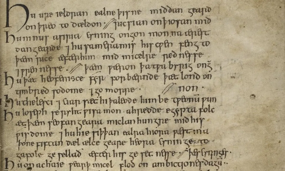 Page of a medieval manuscript with lines of brown Old English handwriting and a column of large letter h initials down the left margin.