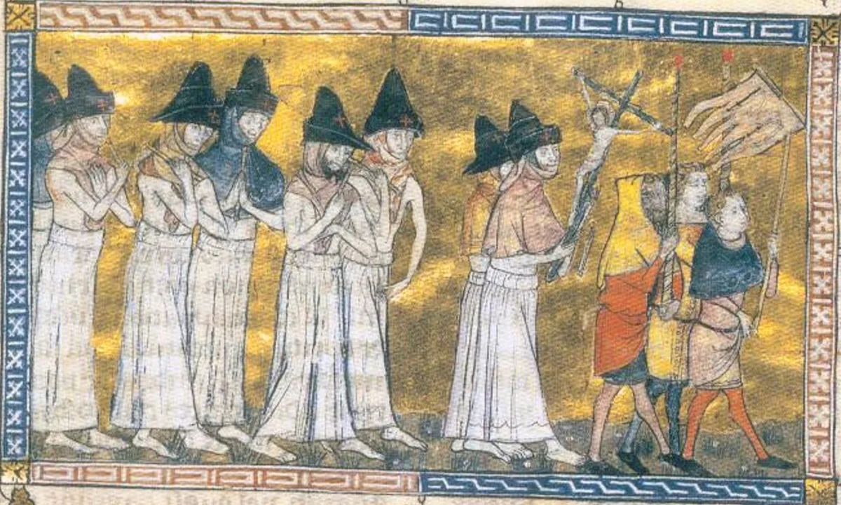 Medieval manuscript painting of a procession of hooded, bare-backed men carrying whips and a banner.