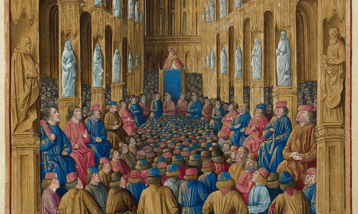 Late medieval manuscript painting of a pope preaching from a platform to a crowd of clergy and nobles in a town square.
