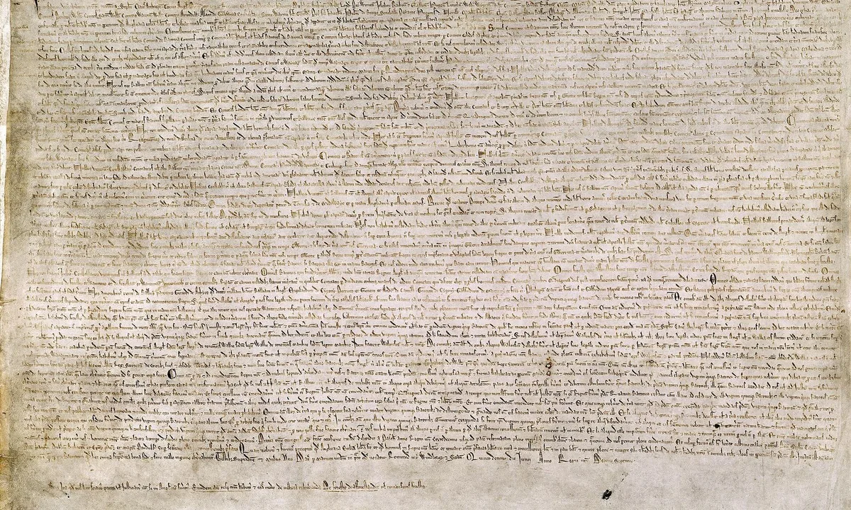 Large sheet of parchment covered edge to edge with tiny lines of dense Latin handwriting.